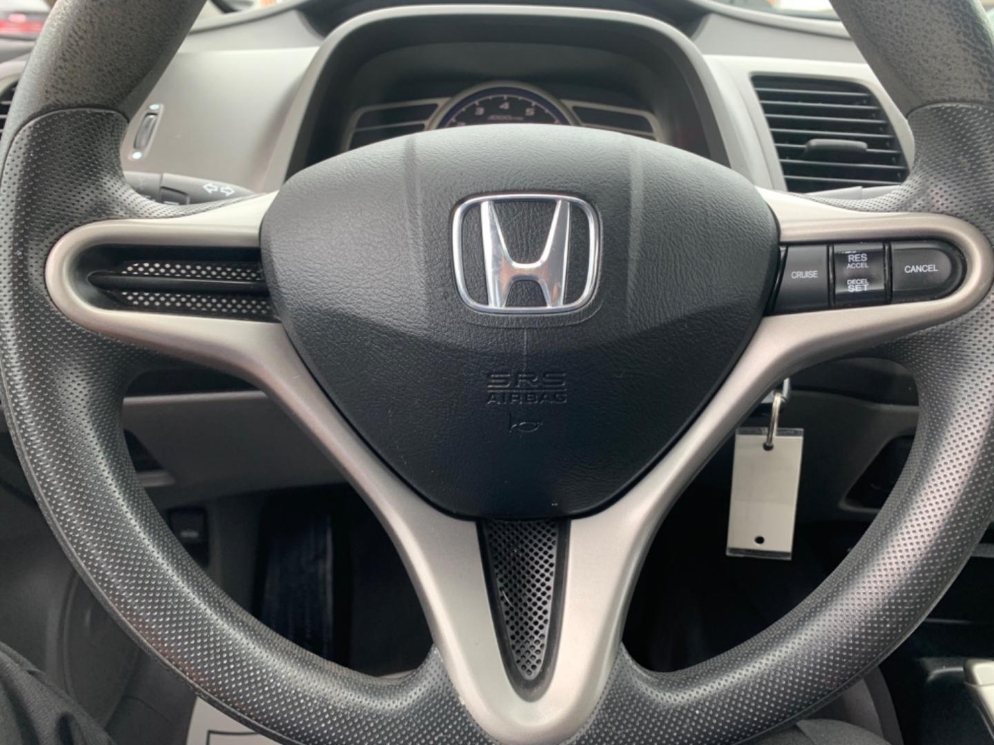 2010 Black /gray Honda Civic LX Sedan (19XFA1F56AE) with an 1.8L L4 SOHC 16V engine, Automatic transmission, located at 1830 North Belt Line Road, Irving, TX, 75061, (469) 524-0199, 32.834373, -96.993584 - Photo#12